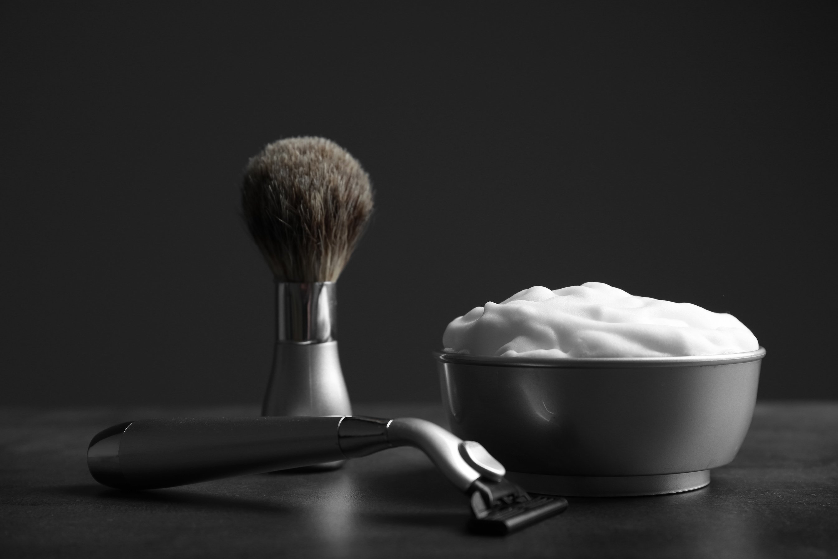 Shaving Accessories for Men on Dark Table 