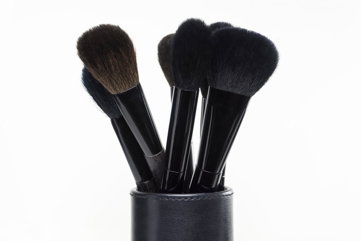 makeup brush in stand